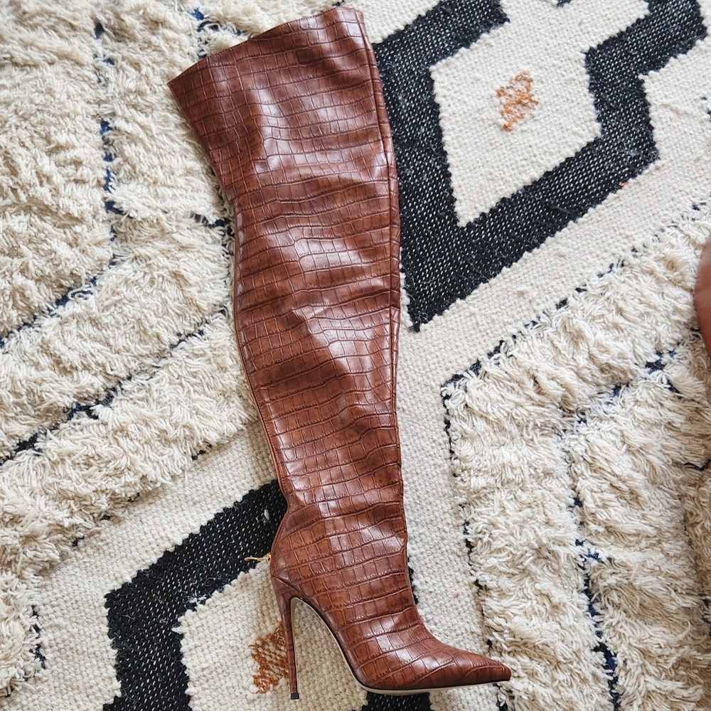 Thigh high brown boot